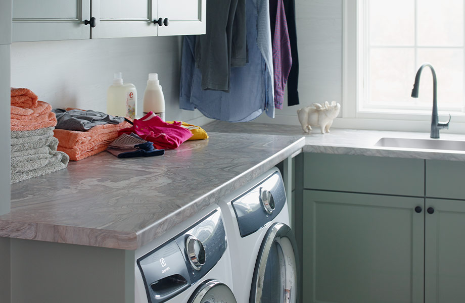  Front-loading washer and dryer with large workspace above 