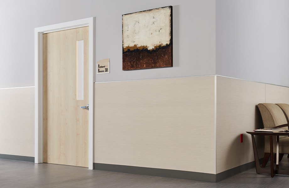 A healthcare waiting room with tan-neutral HardStop Decorative Protection Panels on the wall