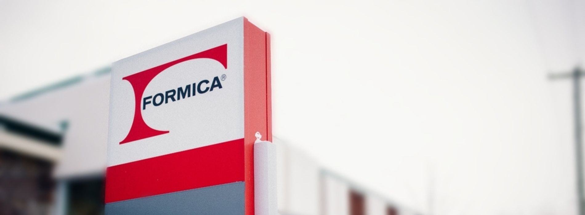 Formica Canada sign, red, grey and white with Formica logo